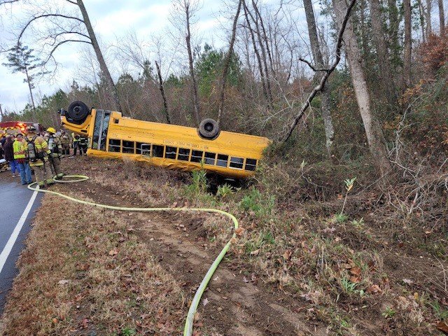 Cumberland school bus flips over on Slocomb Road; injuries not life ...
